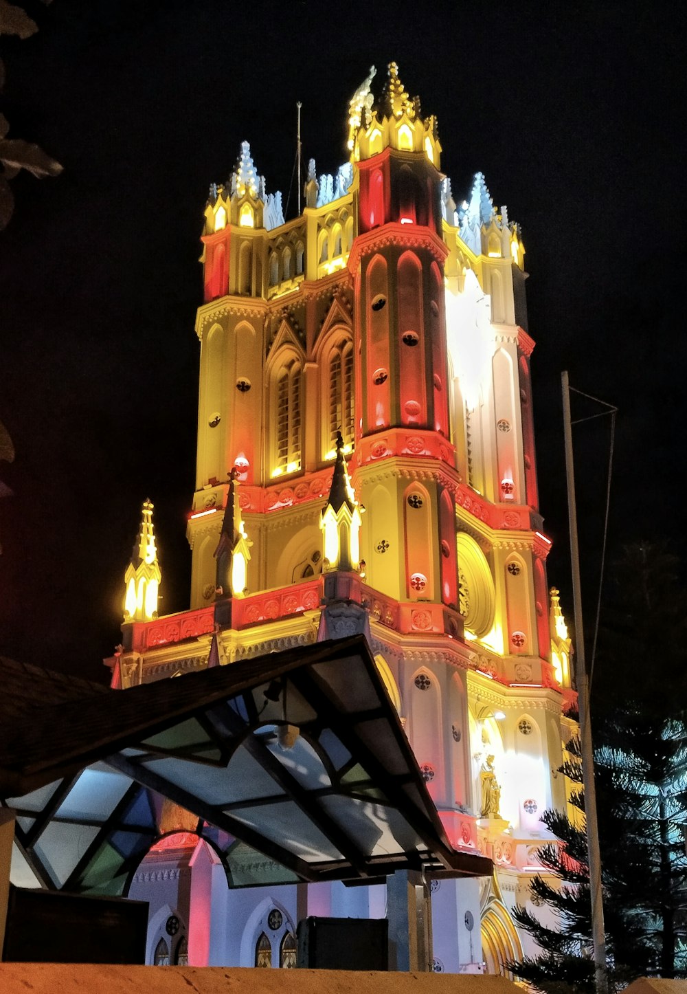 a very tall building with a clock on it's side