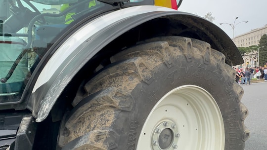 a large tractor parked on the side of a road