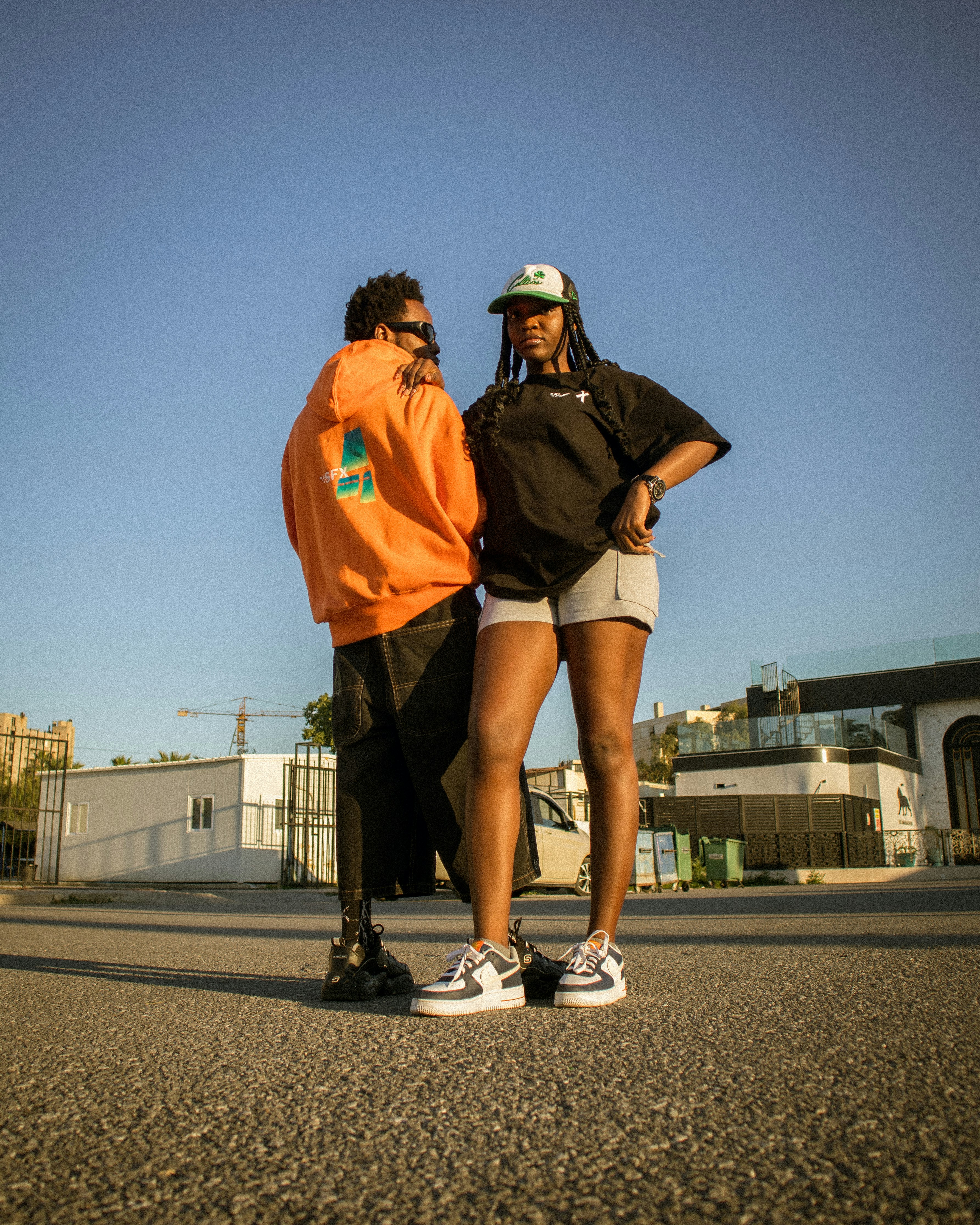 a couple of people standing next to each other