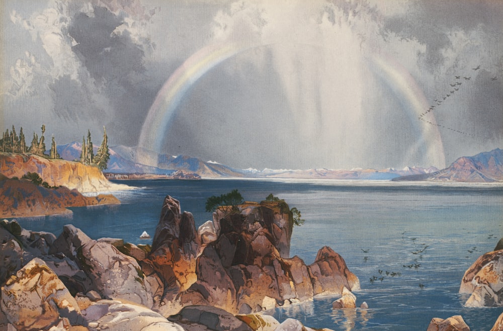 una pintura de un arco iris sobre un cuerpo de agua