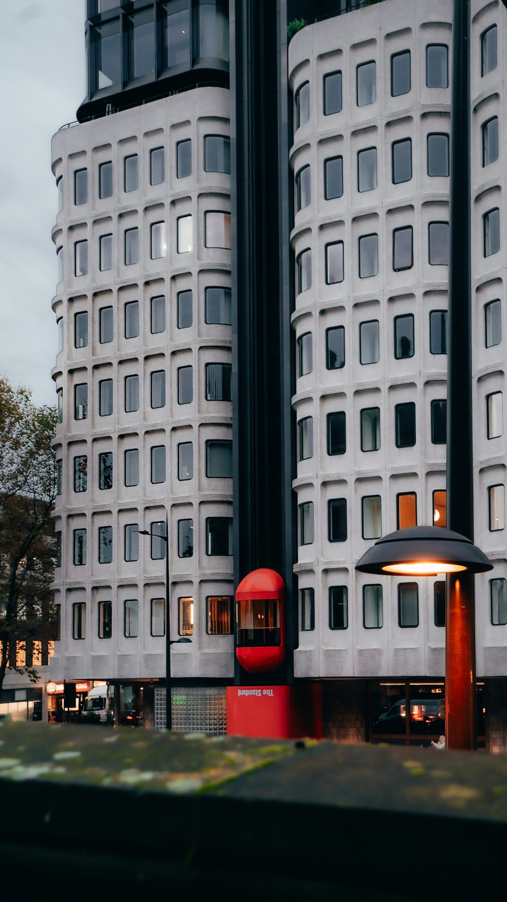 a couple of tall buildings sitting next to each other