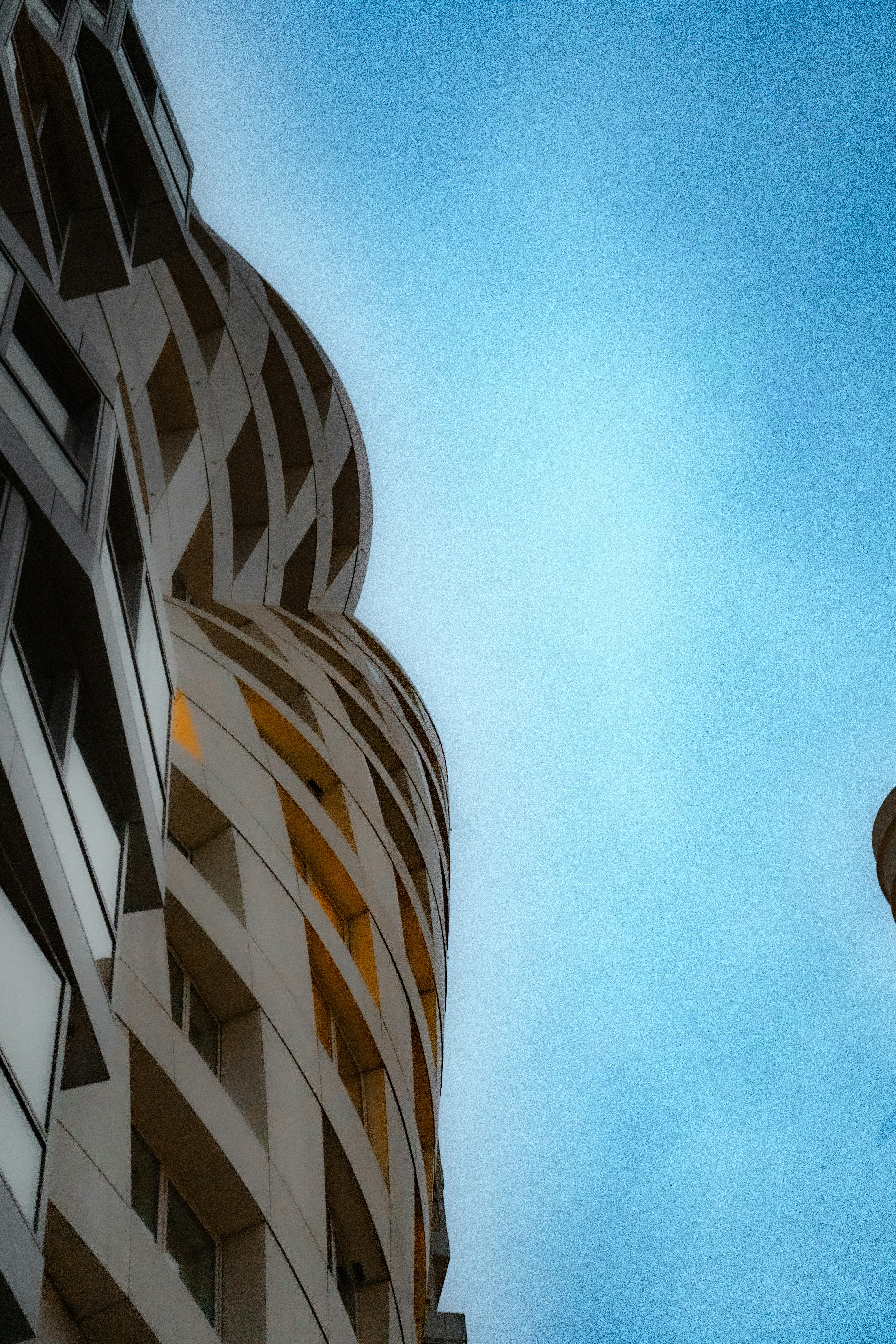 a tall building with a clock on the side of it