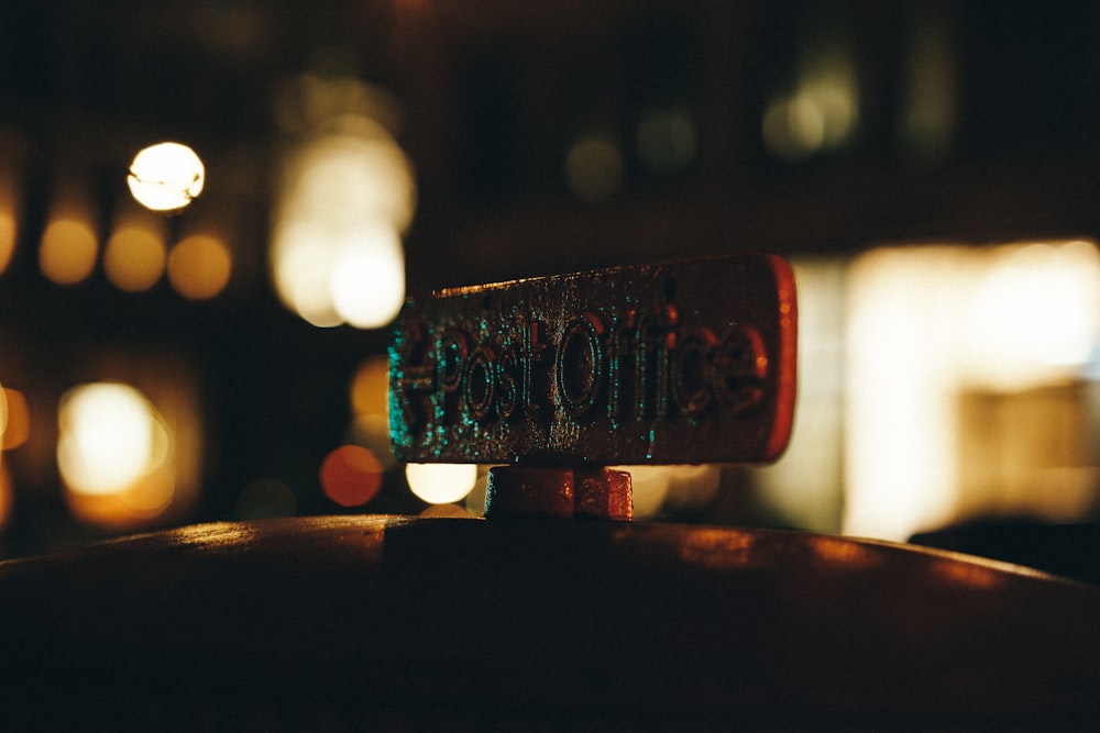 a close up of a wooden barrel with a blurry background