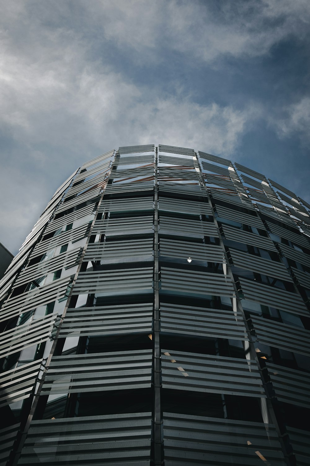 a very tall building with a sky in the background