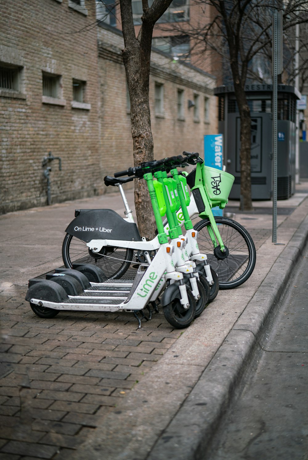 a scooter parked on the side of a street