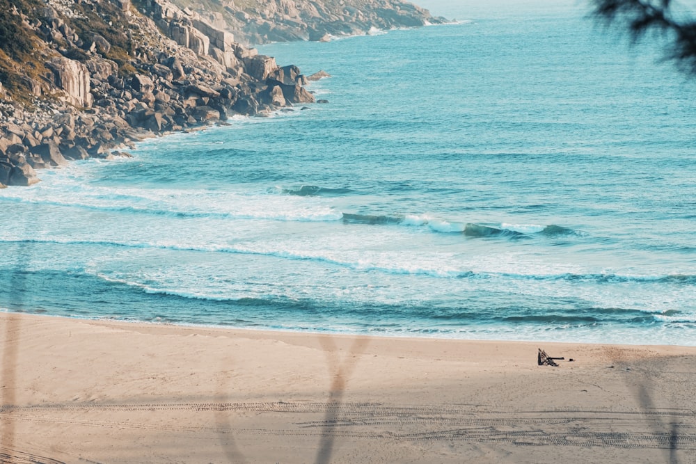 a view of the ocean from a beach