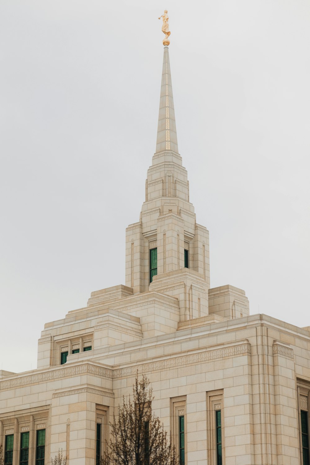 a large white building with a steeple on top