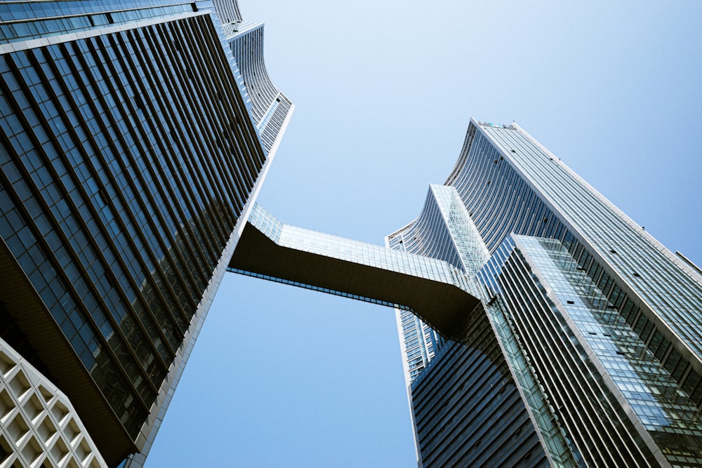 a group of tall buildings towering up into the sky