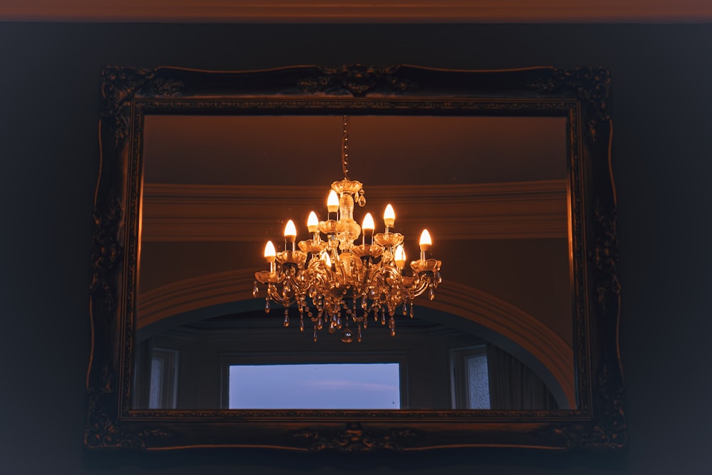 a chandelier hanging from the ceiling of a room