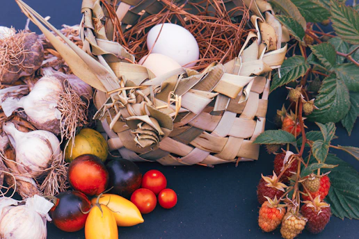 a basket filled with lots of different types of fruits and vegetables