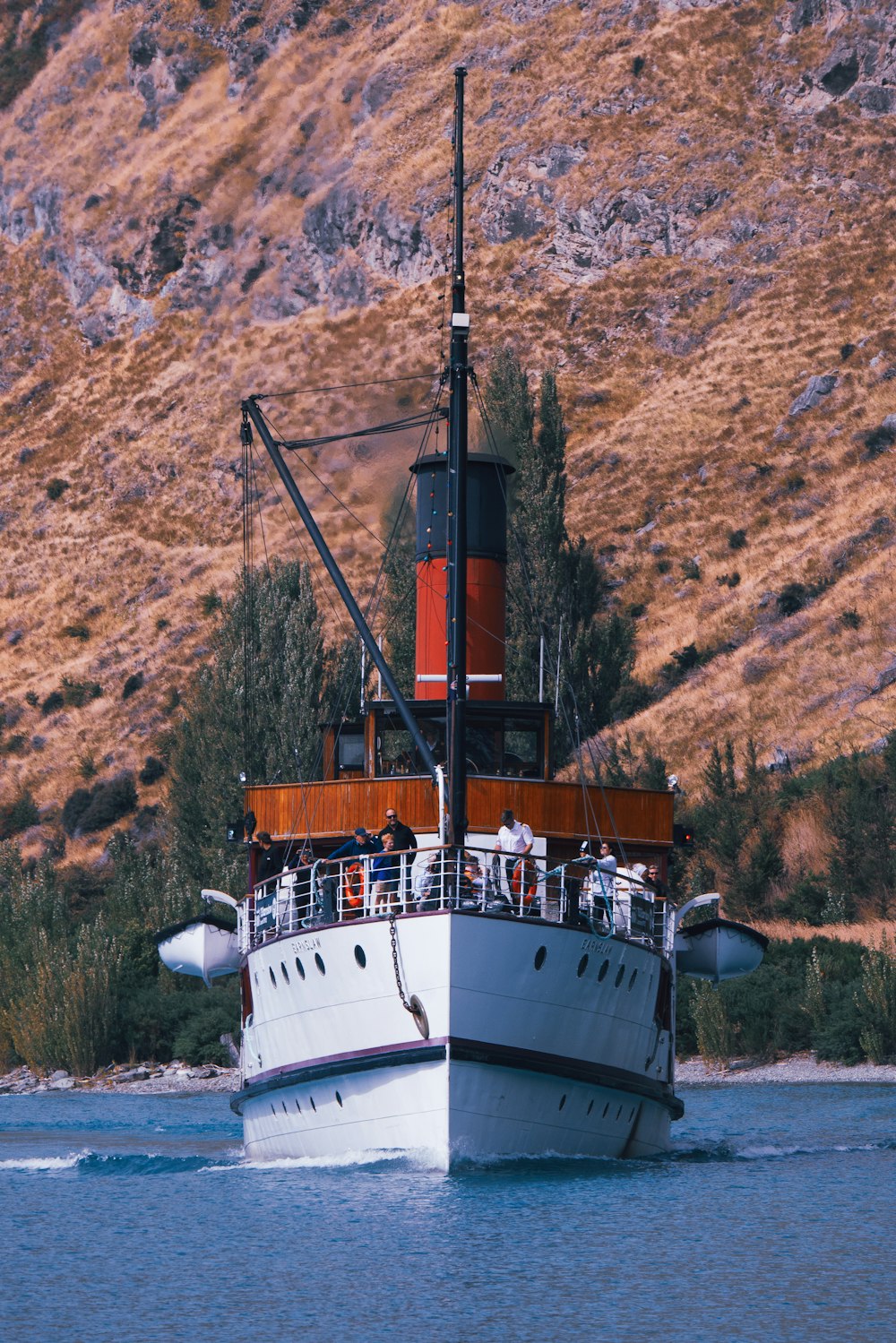 a large boat in the middle of a body of water