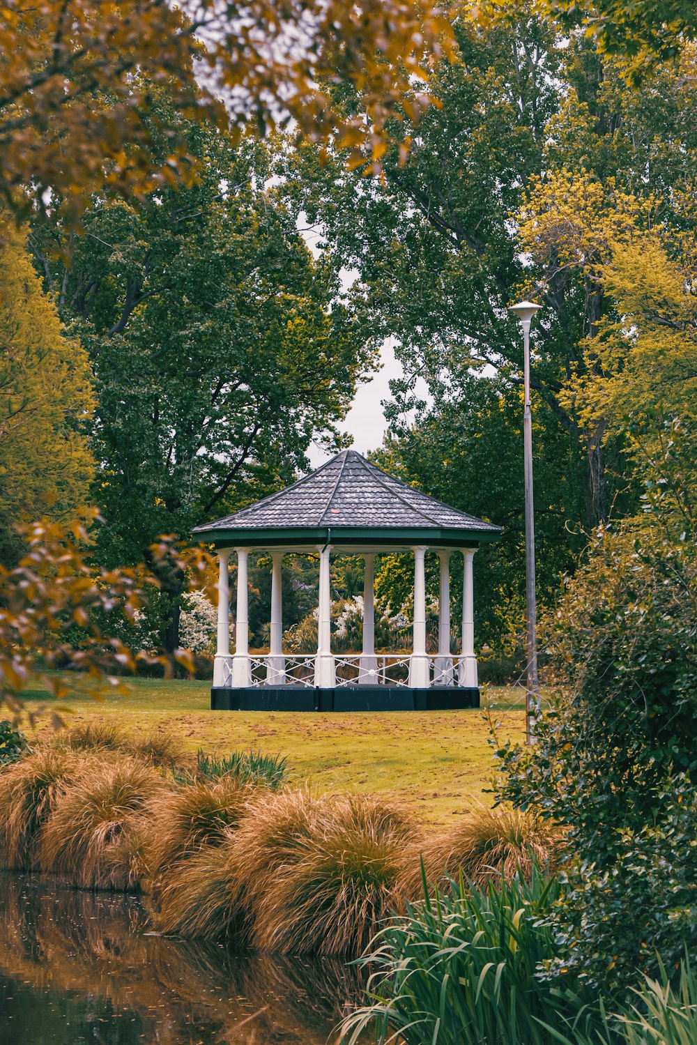 a gazebo in the middle of a grassy area