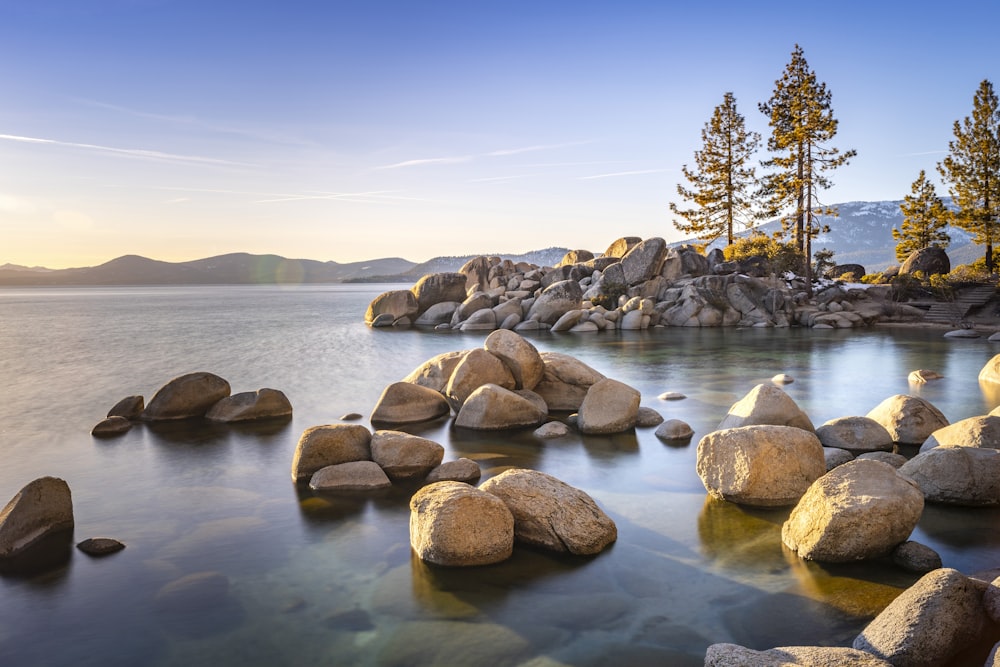 a large body of water surrounded by rocks