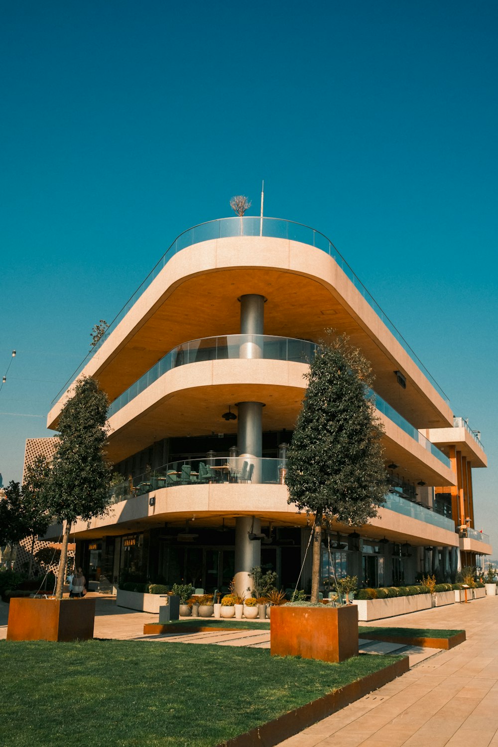 a tall building with a balcony on top of it