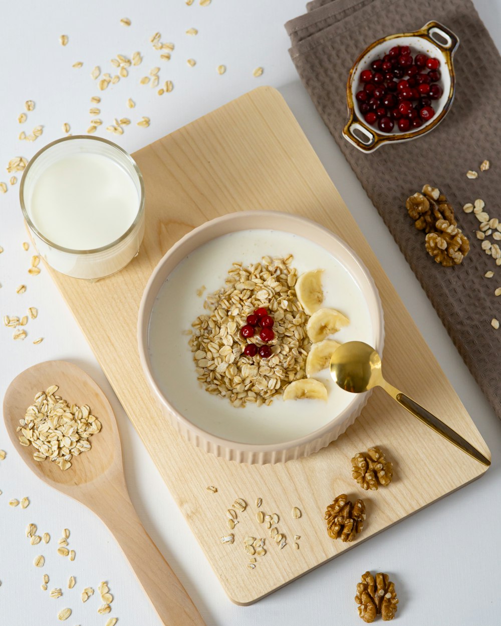 a bowl of oatmeal and a glass of milk