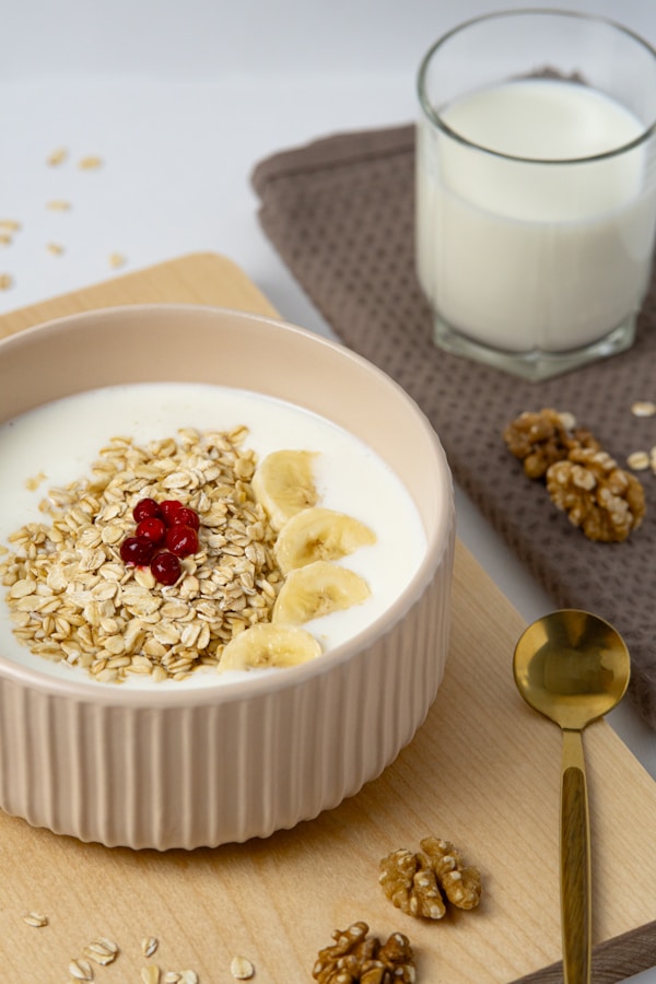 A bowl of oatmeal and a glass of milk