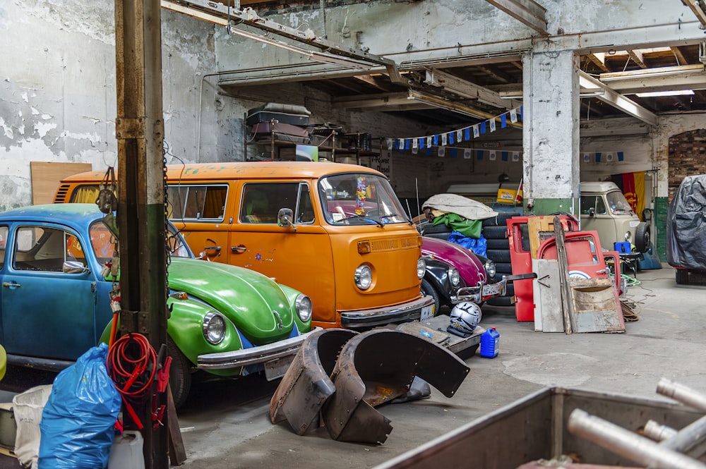 a garage filled with lots of different colored cars