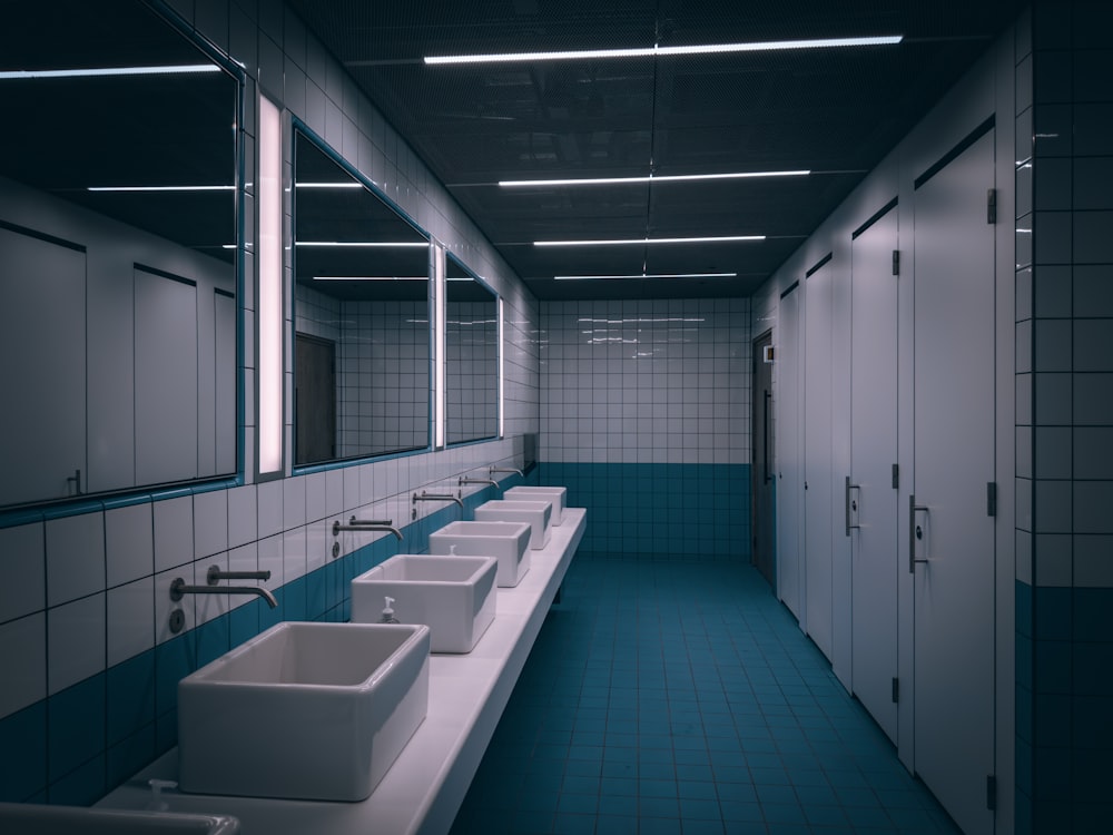 a row of sinks in a public restroom