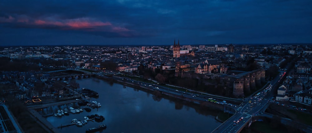 an aerial view of a city at night