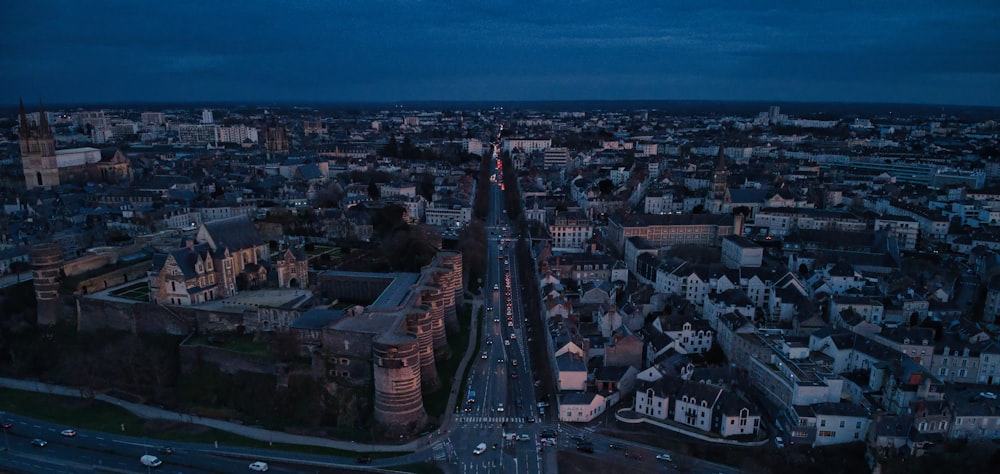 an aerial view of a city at night