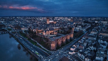 an aerial view of a city at night