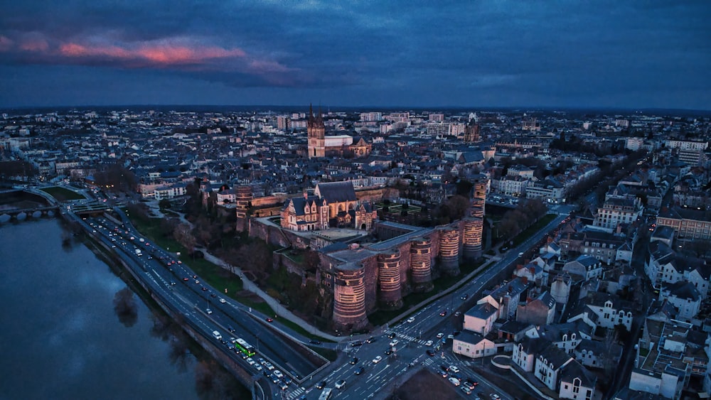 an aerial view of a city at night