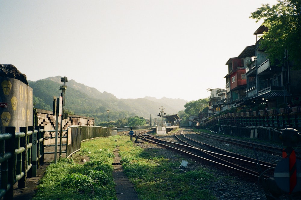 a train track with a person walking on it