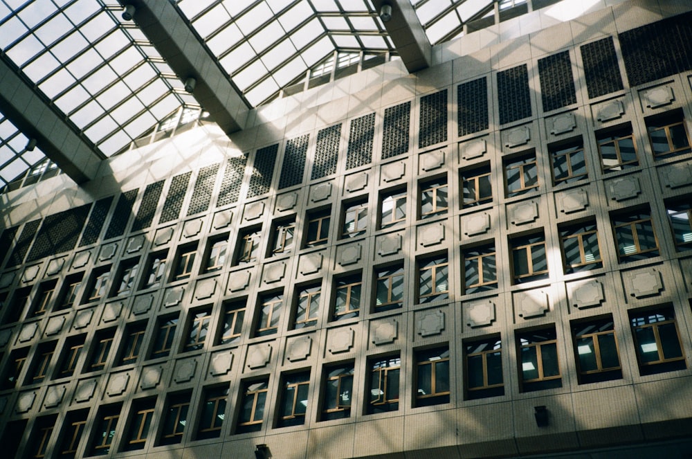 a tall building with lots of windows and a skylight