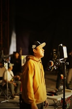 a man standing in front of a camera