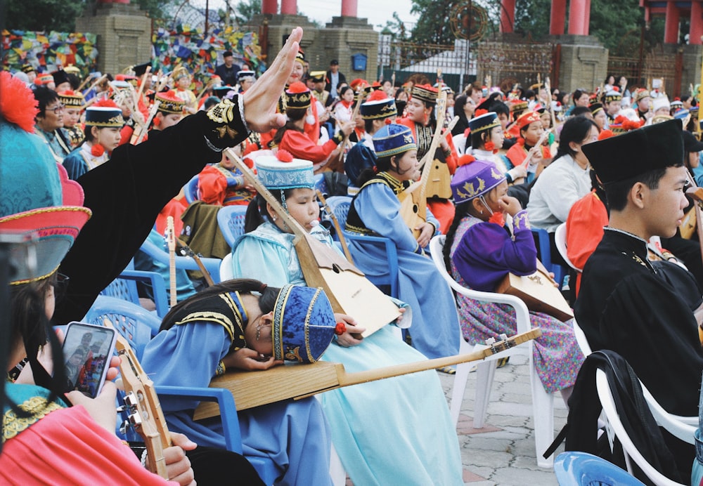 a large group of people dressed in costumes