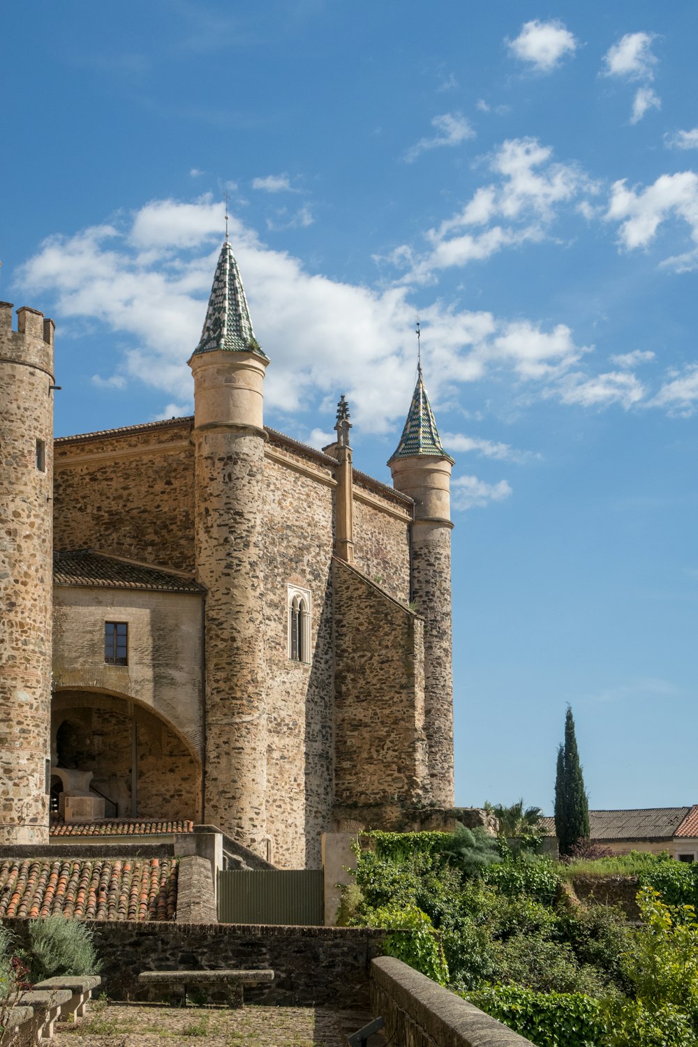 a large castle with two towers on top of it