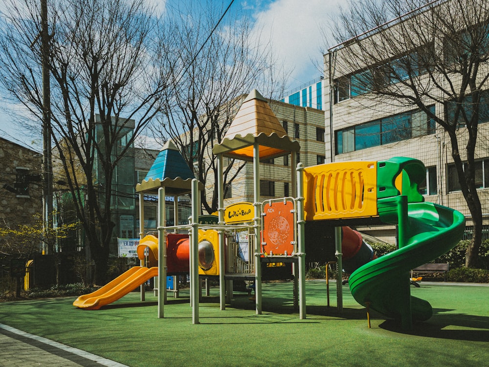 a children's play area in front of a building