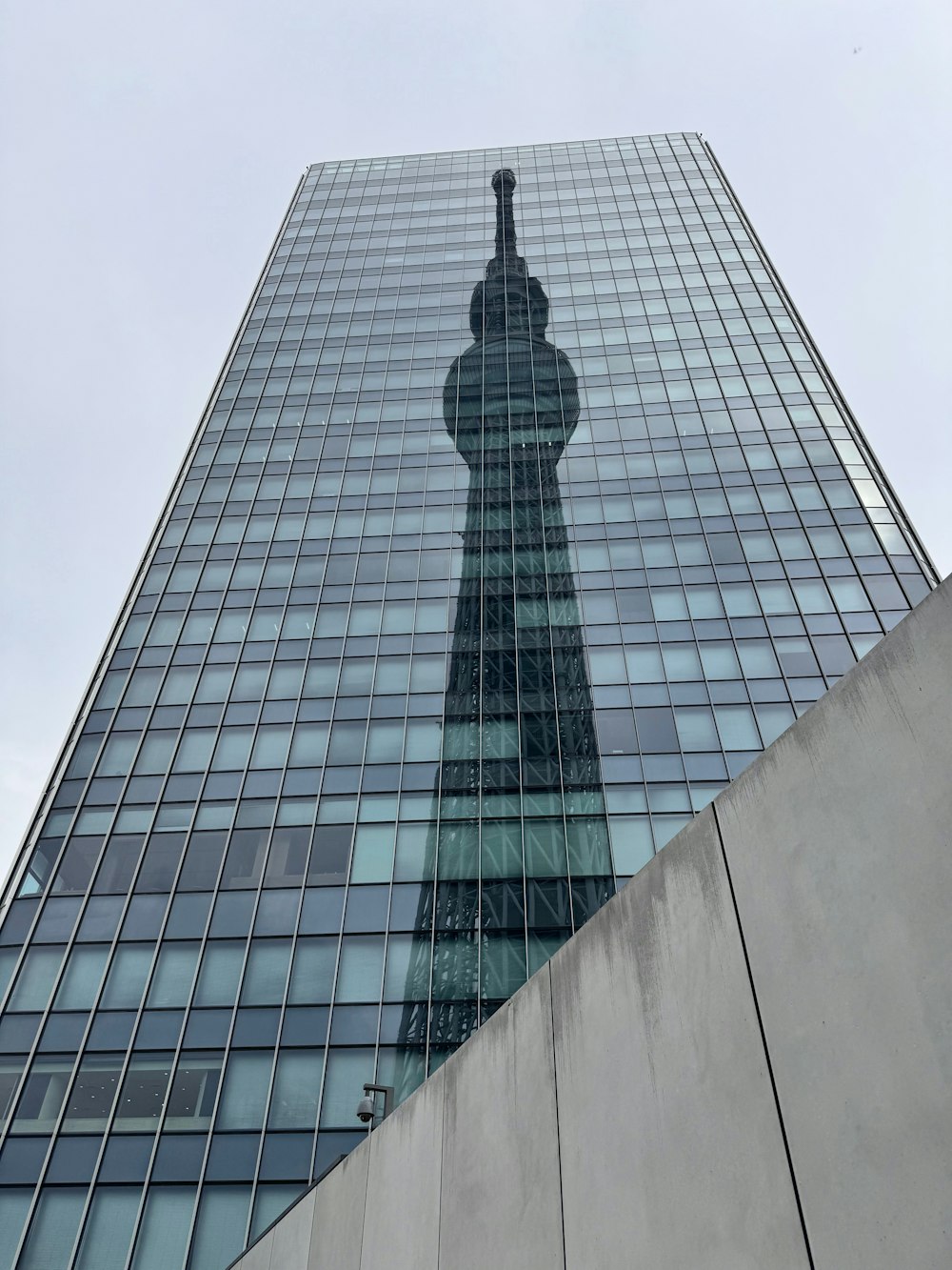 a very tall building with a clock on it's side