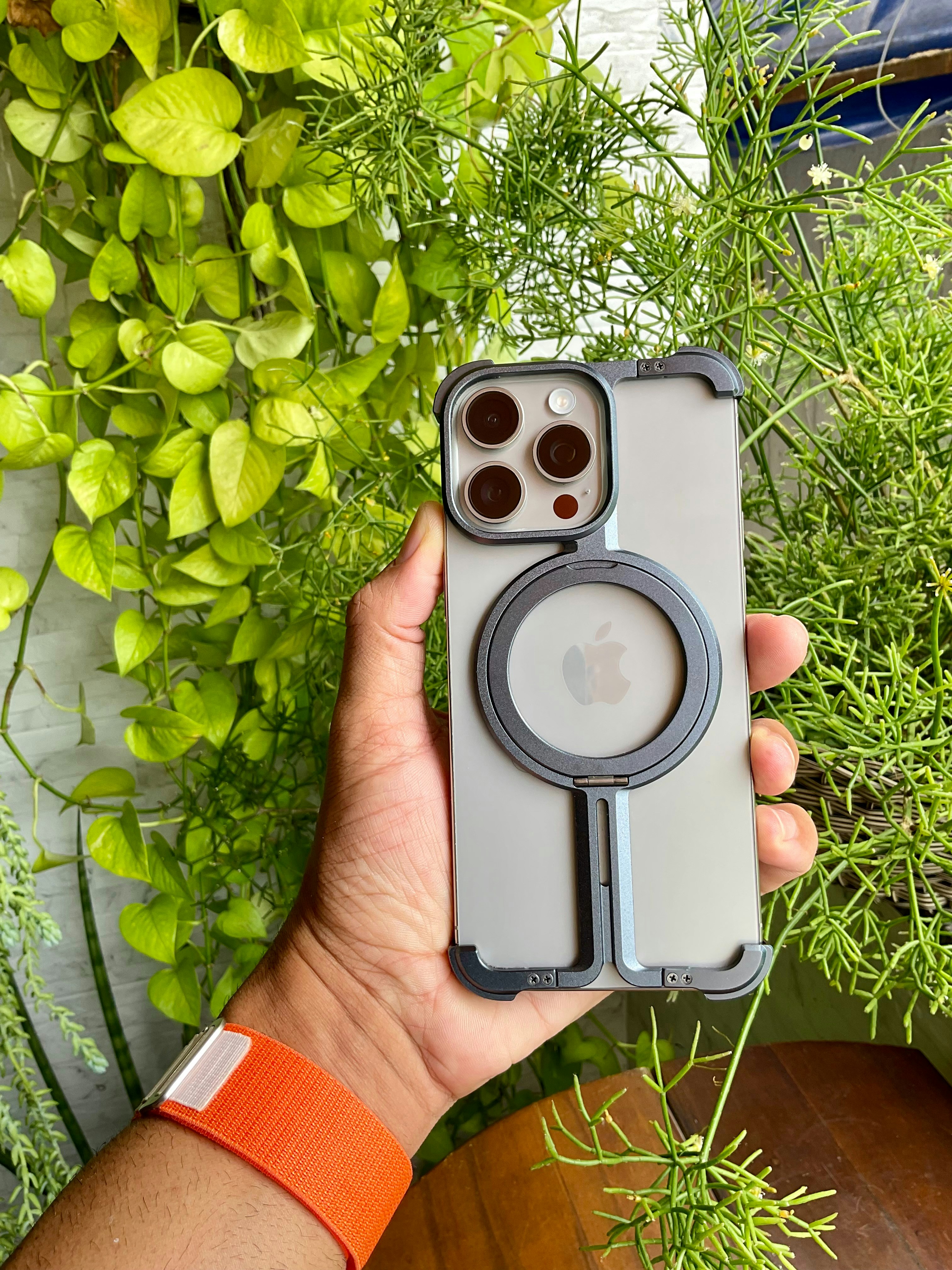 Green plant sensors with circuit board overlay, IoT environmental monitoring equipment in lush indoor setting