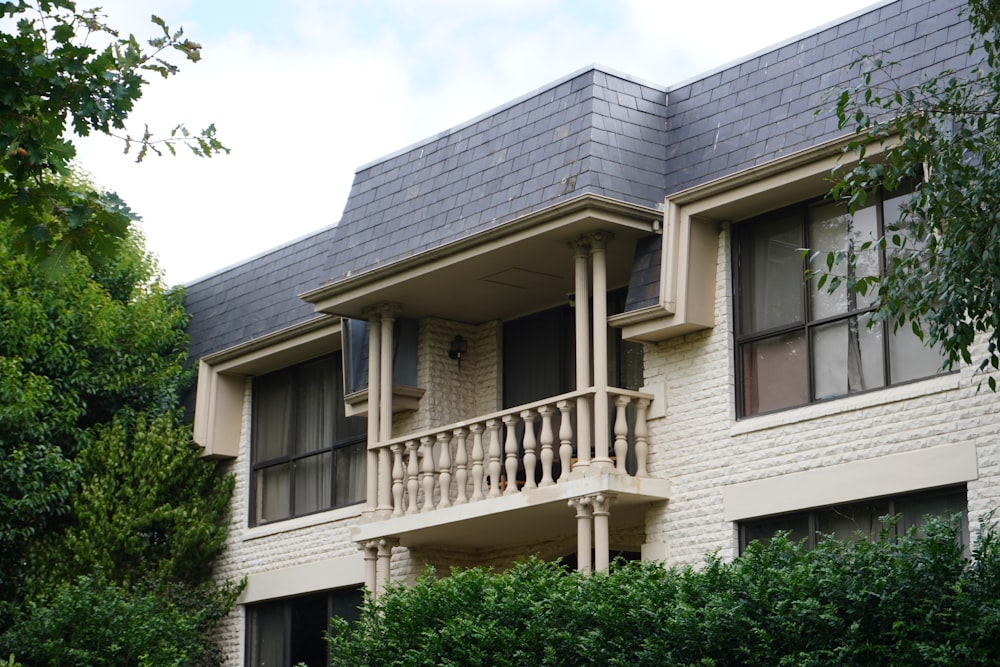 an apartment building with balconies and balconies on the balconies