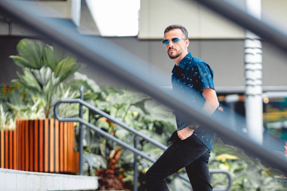 a man walking down a flight of stairs