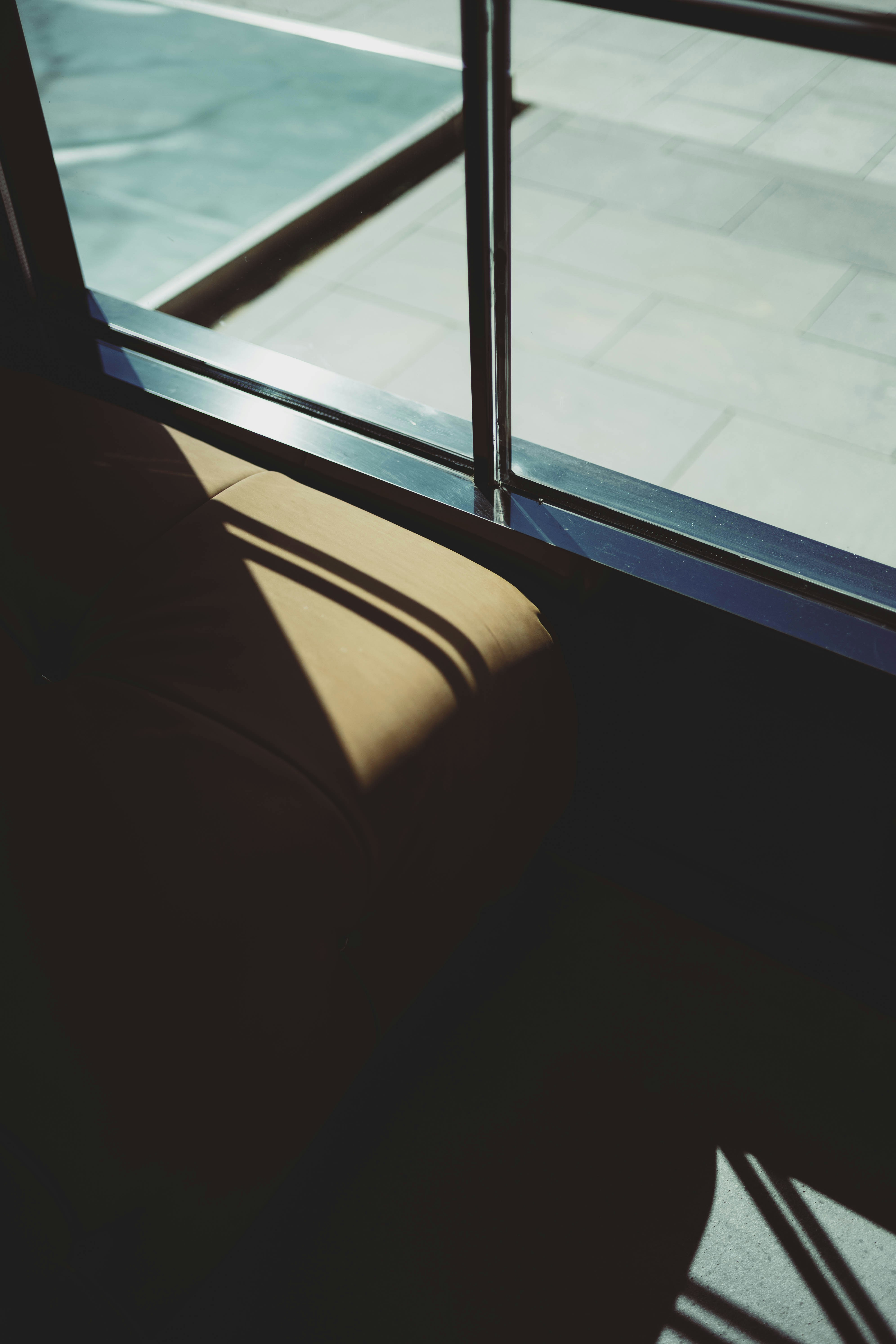 a chair that is sitting in front of a window
