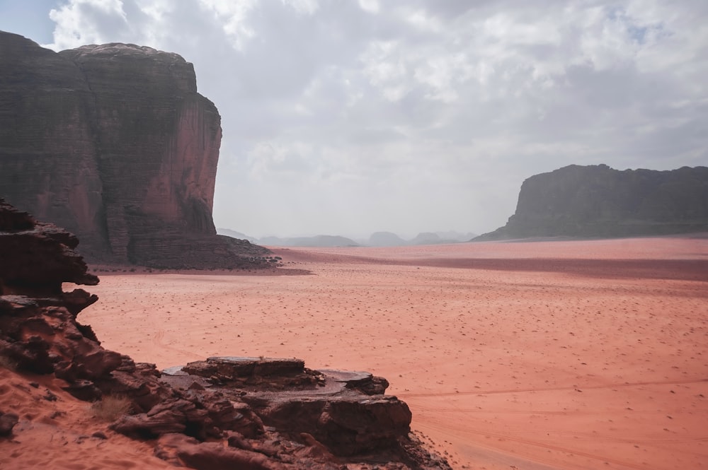 a rocky outcropping in the middle of a desert