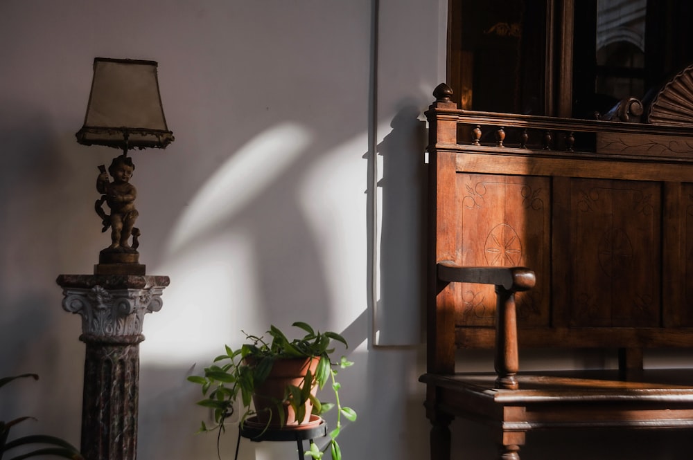 a room with a lamp and a chair