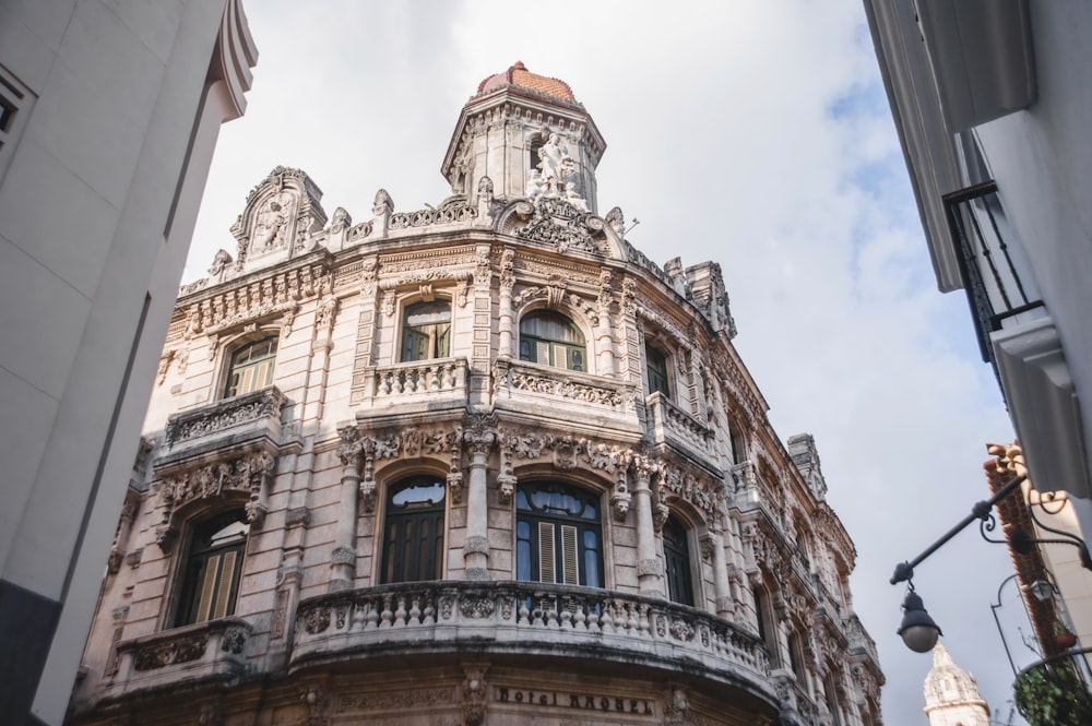 a tall building with a clock on the top of it