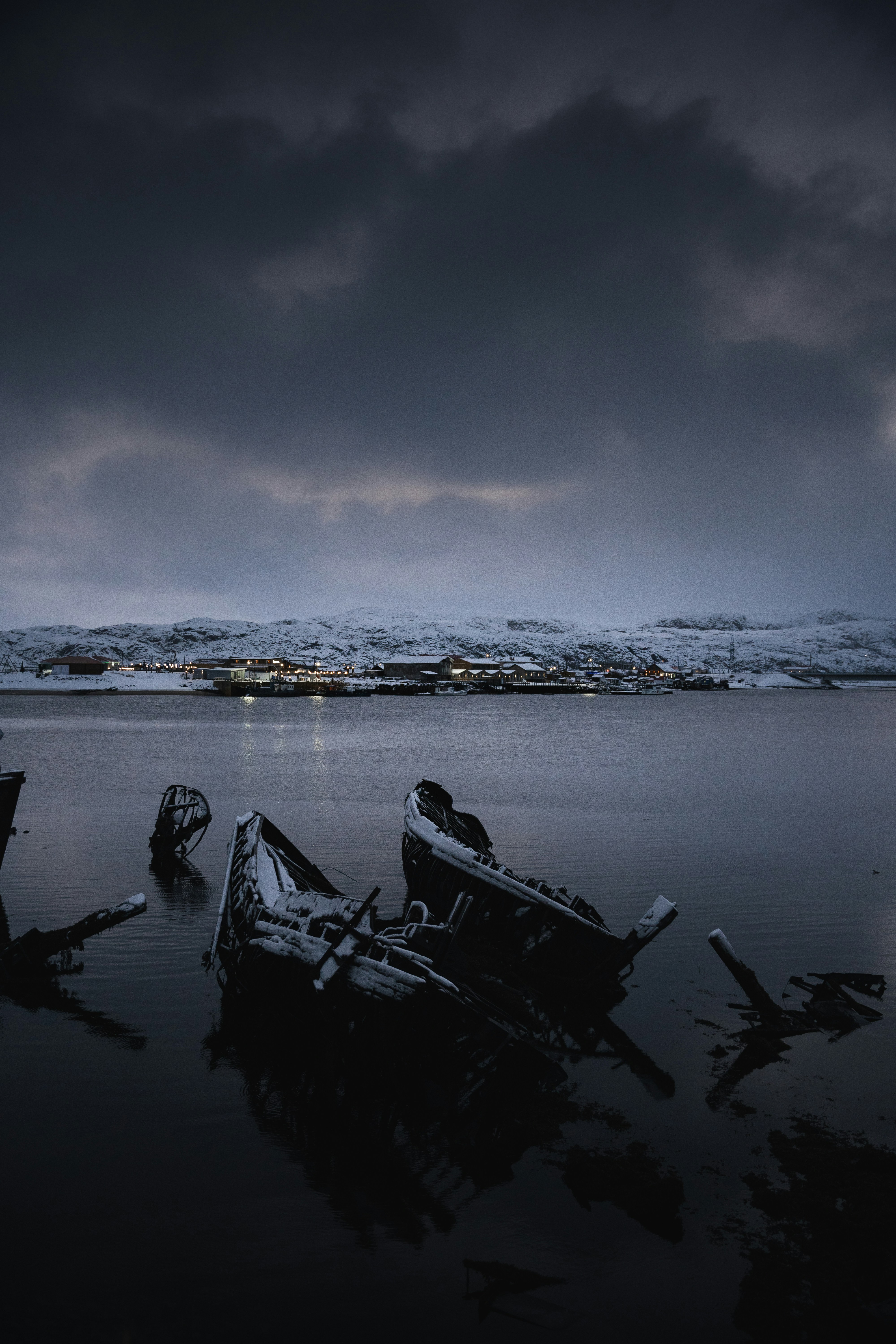 a couple of boats that are sitting in the water