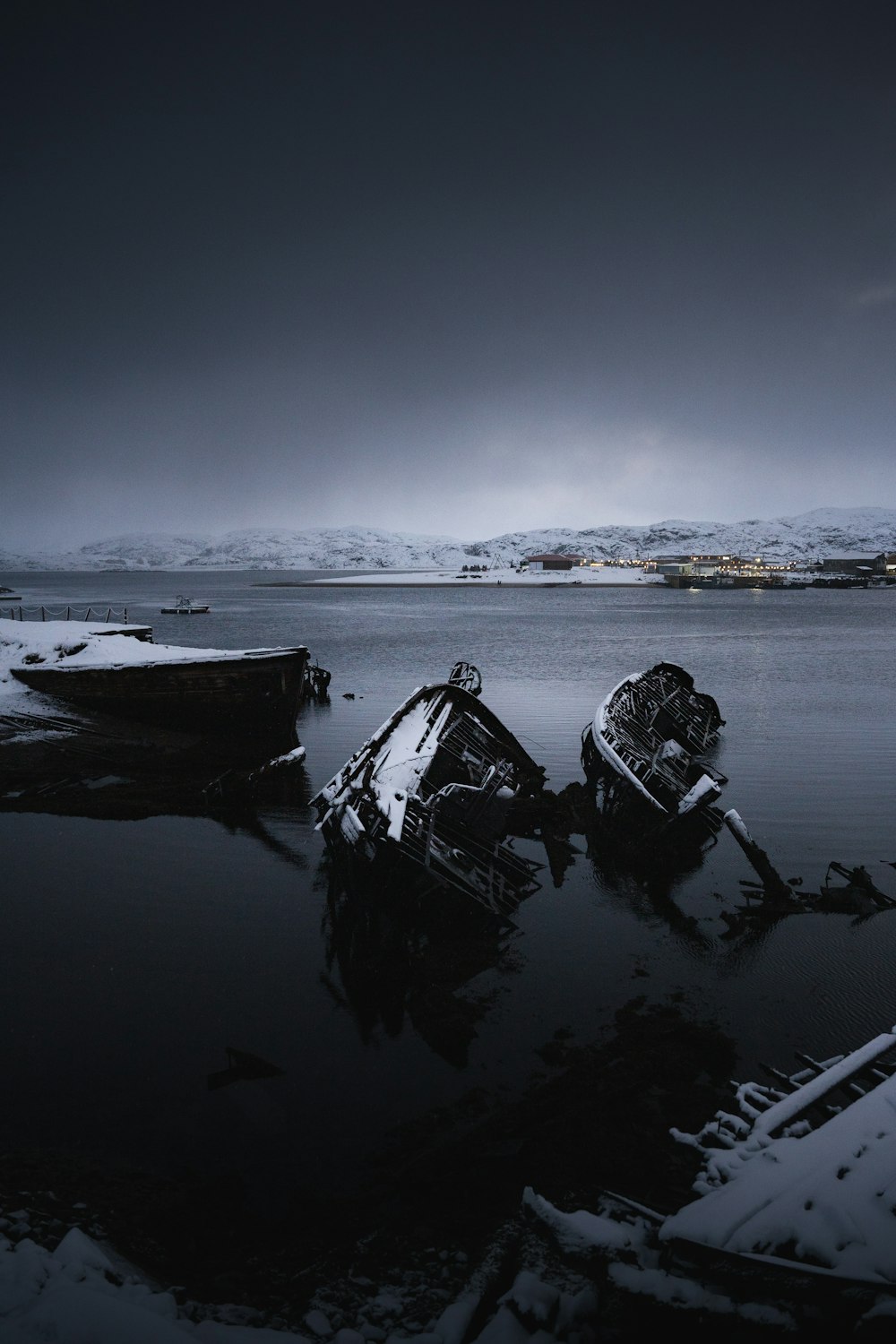 a couple of boats that are sitting in the water