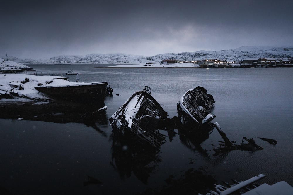 a couple of boats that are sitting in the water