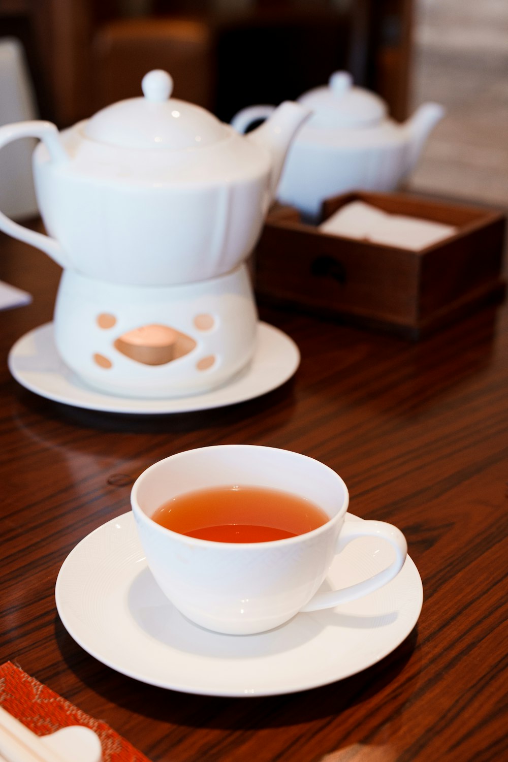 a cup of tea sits on a table