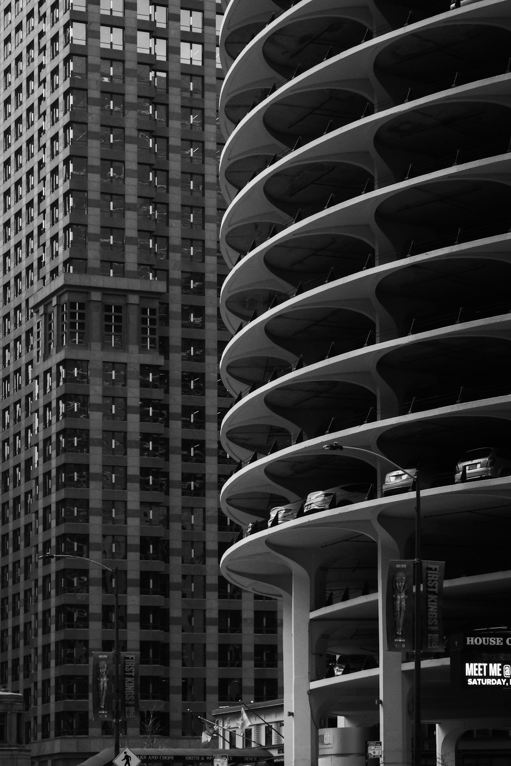 a black and white photo of a very tall building