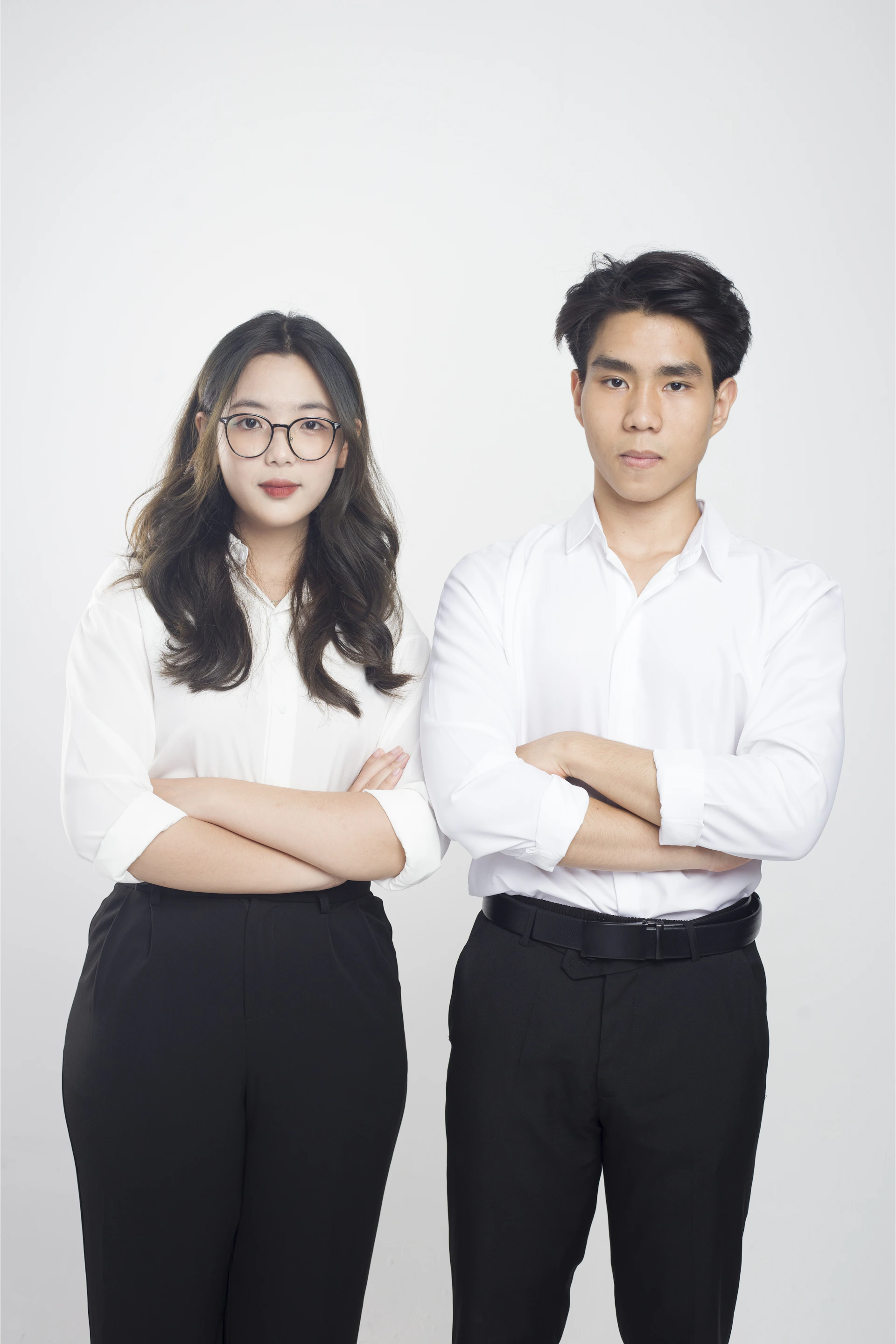 a couple of people standing next to each other