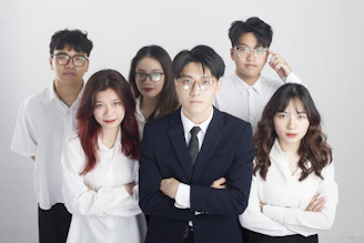 a group of people standing next to each other