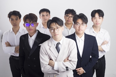 a group of young men standing next to each other