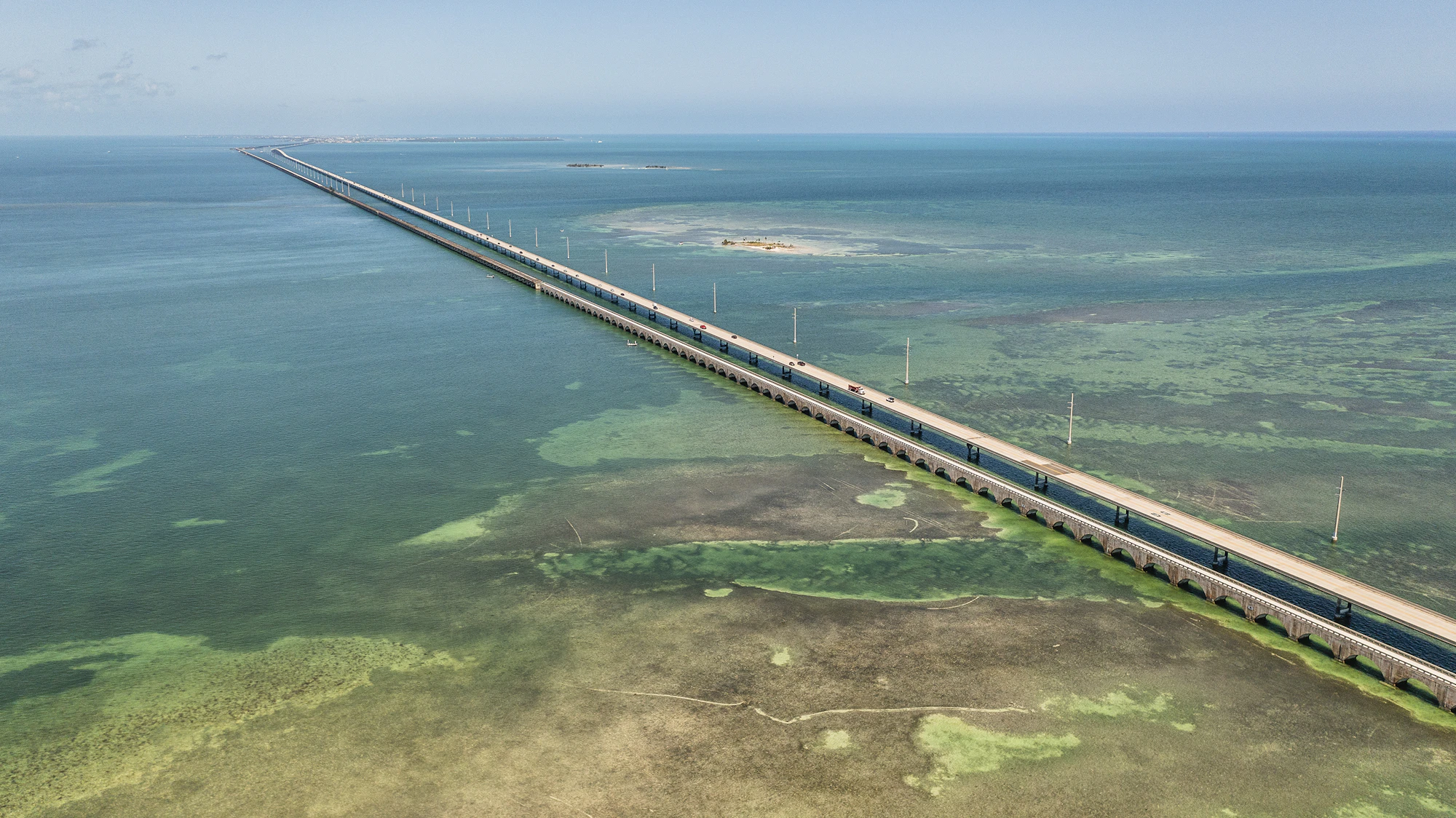 Train crossing a bridge over water