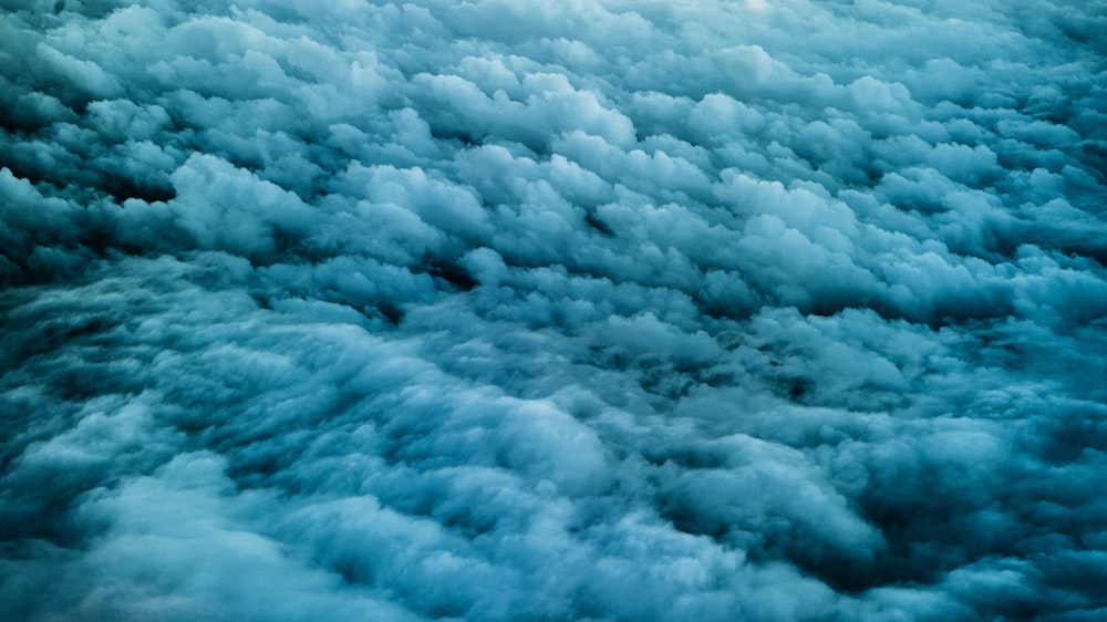 a view of the clouds from an airplane window